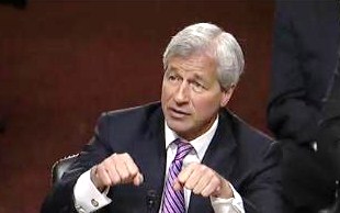 Jamie Dimon, between jobs and mansions in the late 90s, took up boxing.  Here, he shadow boxes with Senate Banking on June 13, 2012. 