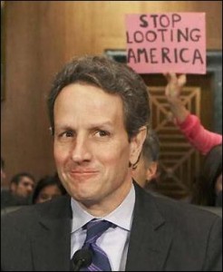 The Non Profit Organization, Code Pink, Appeared on Multiple Occasions Holding Protest Signs Behind Geithner as he Appeared Before Congress to Explain the Massive Bailouts of the Banks