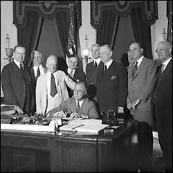 Present Franklin Delano Roosevelt Signing the Glass-Steagall Act on June 16, 1933