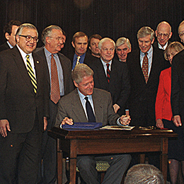 President Bill Clinton Signs the Gramm-Leach-Bliley Act on November 12, 1999, Repealing the Glass-Steagall Act