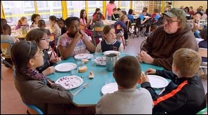 In a Scene from "Where to Invade Next," Michael Moore Experiences the Healthy Meal Made By a Chef for Public School Students in France