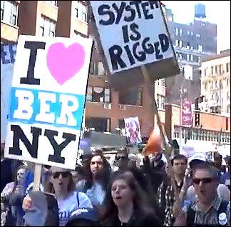 System Is Rigged Poster at Bernie Sanders March