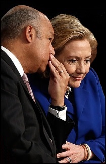 Homeland Security Chief Jeh Johnson Whispers to Hillary Clinton During an Awards Ceremony in 2014