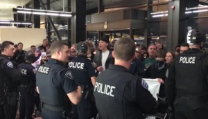 Police at Seattle-Tacoma International Airport Drag Protester to the Ground During Rally Against Trump's Executive Order on Refugees and Green Card Holders from Seven Muslim-Majority Countries
