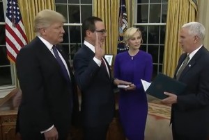 Vice President Mike Pence Swears In Steven Mnuchin as U.S. Treasury Secretary on February 13, 2017. President Donald Trump and Mnuchin's Fiancée, Louise Linton, Look On.